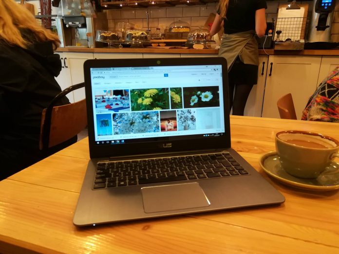21362354_10159107684030618_2052452962_o Laptop on a Cafe table